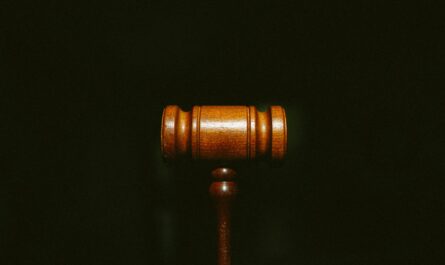 brown wooden stand with black background